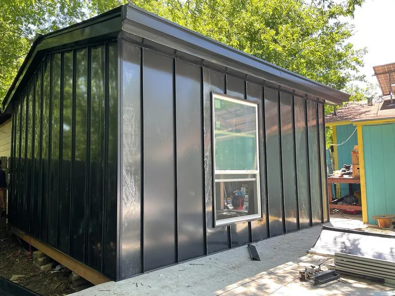 Black standing seam metal wall panels for Metal Roof Installation in St. Albans